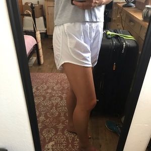 White Nike shorts